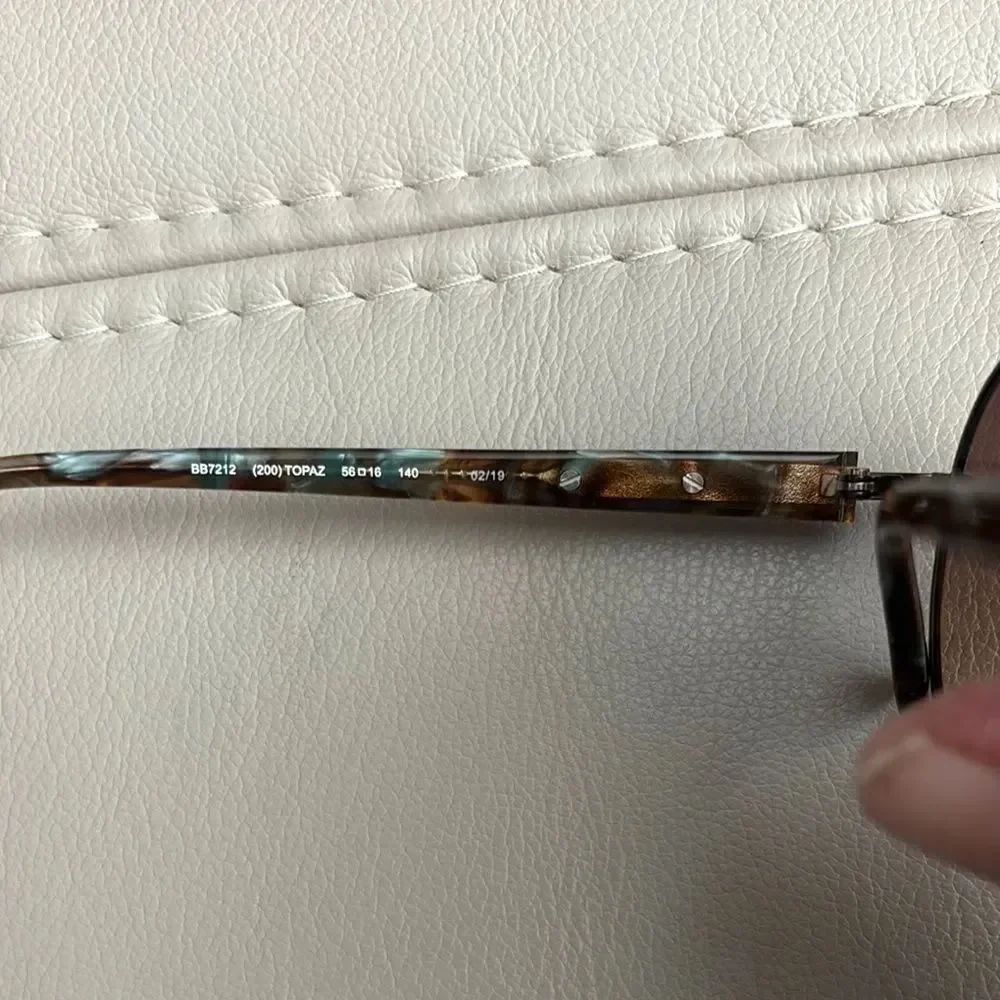 Bebe Round Sunglasses with Swarovski Crystals
